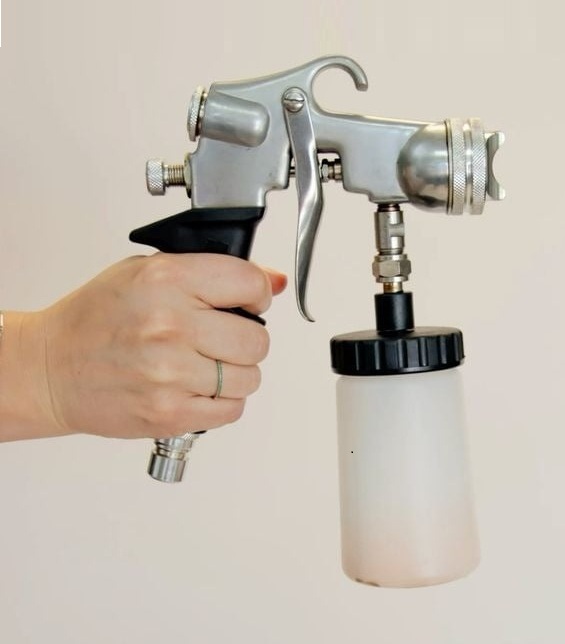 Professional airbrush spray tan gun equipment at Soothe and Sage Spokane WA - custom blended tanning solution